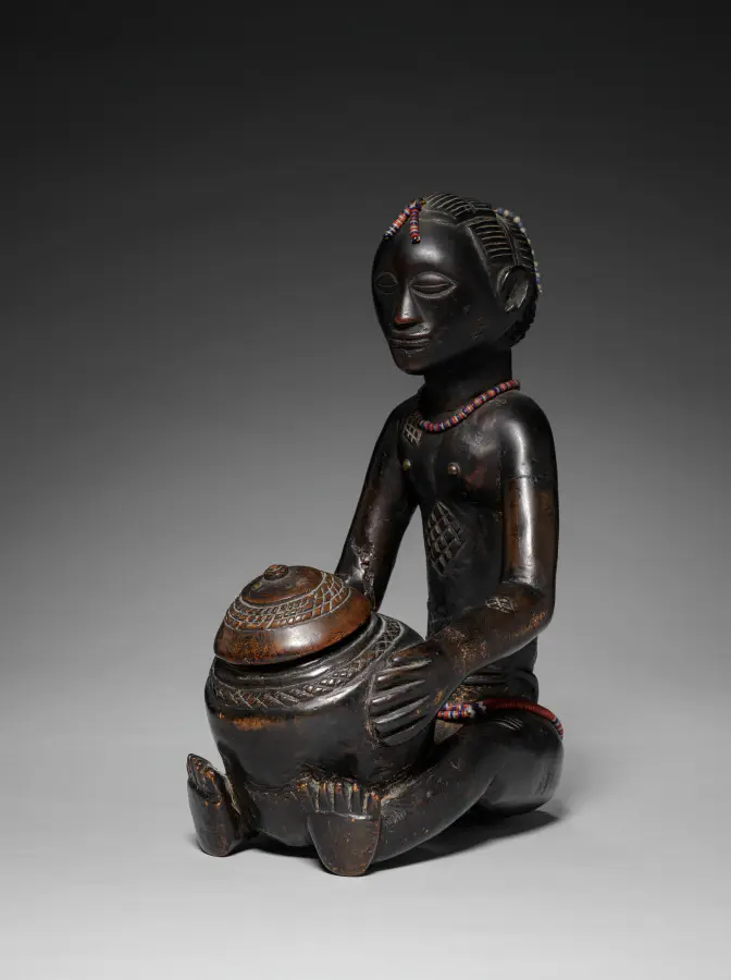 Female Bowl-Bearing Figure