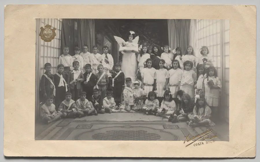 Untitled (Semi-Circle of Children, Central Girl Dressed as an Angel Holding the Baby Jesus)
