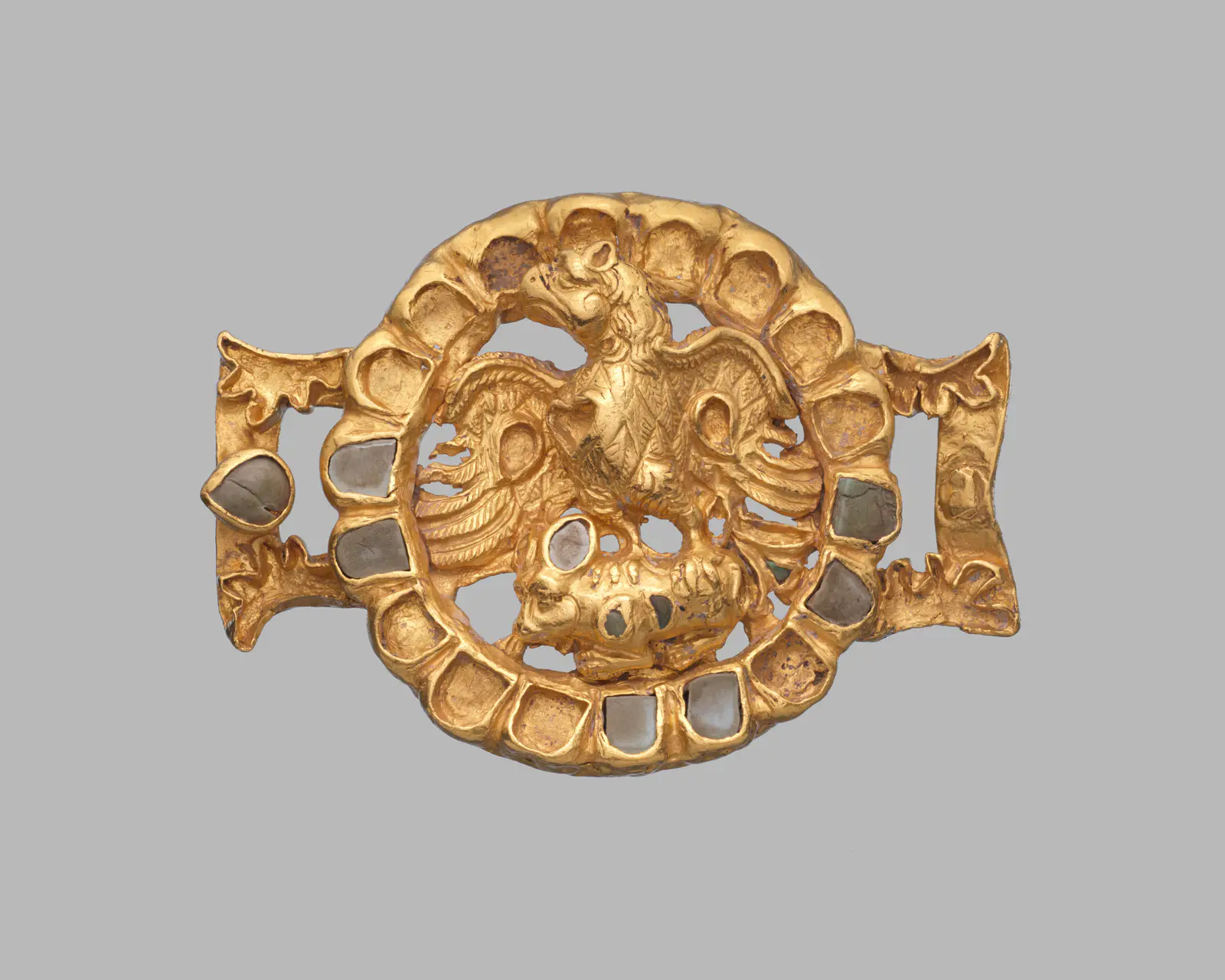 Belt adornment with an eagle and its prey